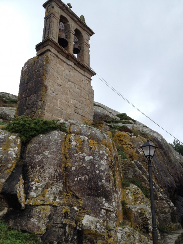 Part of one of the 2 stone churches in Muxia. Standing strong amidst the almost-daily riain. Note all the moss/algae growth on the stones.