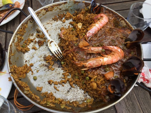 Freshly-made (and half-eaten before I was able to take this photo!) seafood Paella in Pals, Catalonia