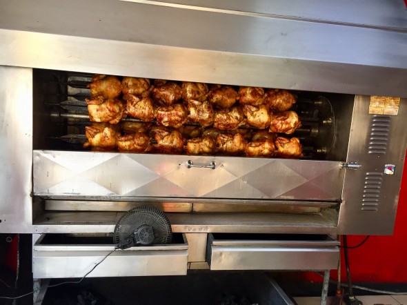 Colombians love roasted chicken. This is a very common sight in every city and town!