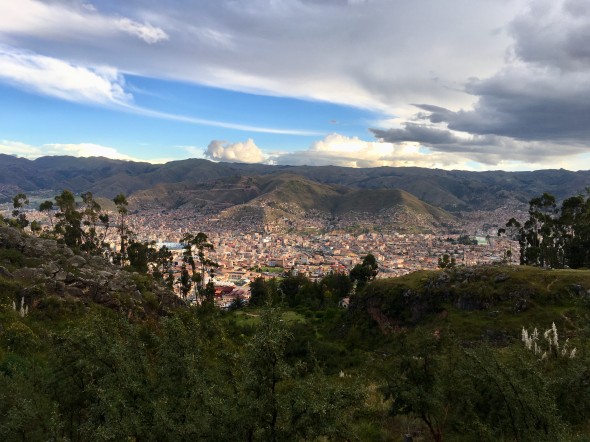 Cusco is a beautiful city with all its tile roofs and mountainous-green surroundings.